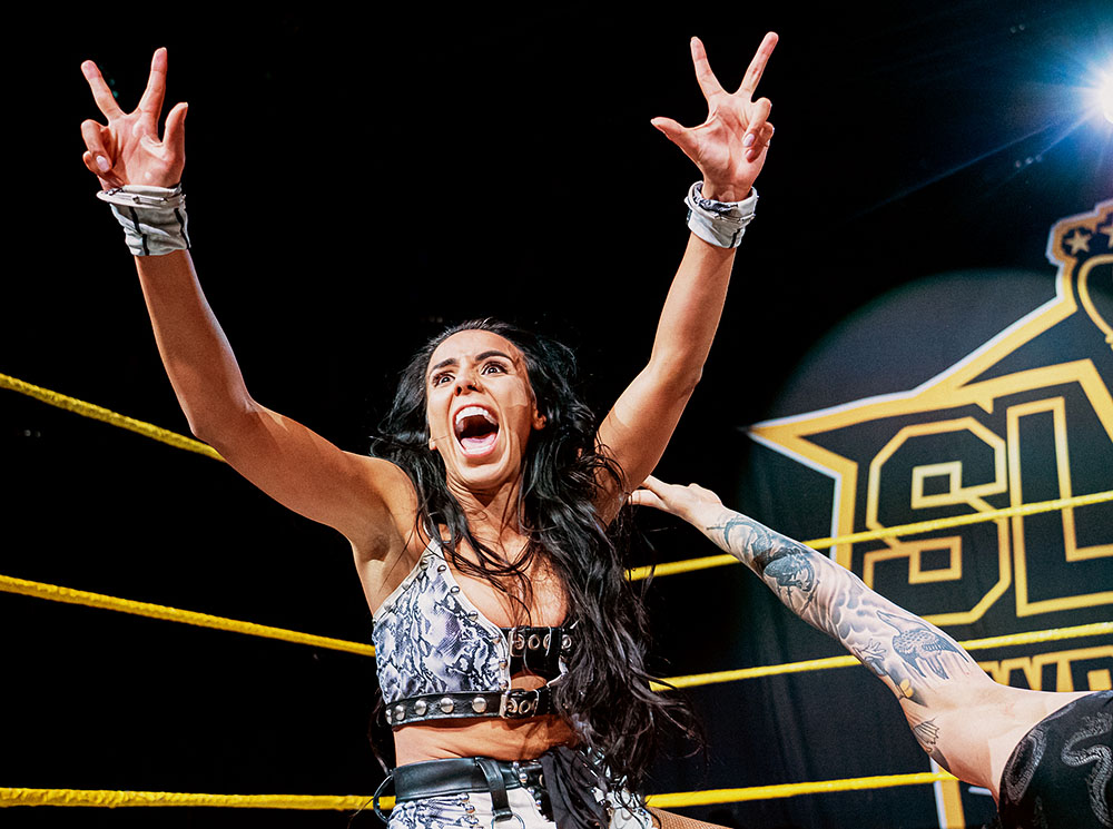 Amale, a French professional wrestler, being intense in her match against Sweden's Aliss Ink, in 2025.