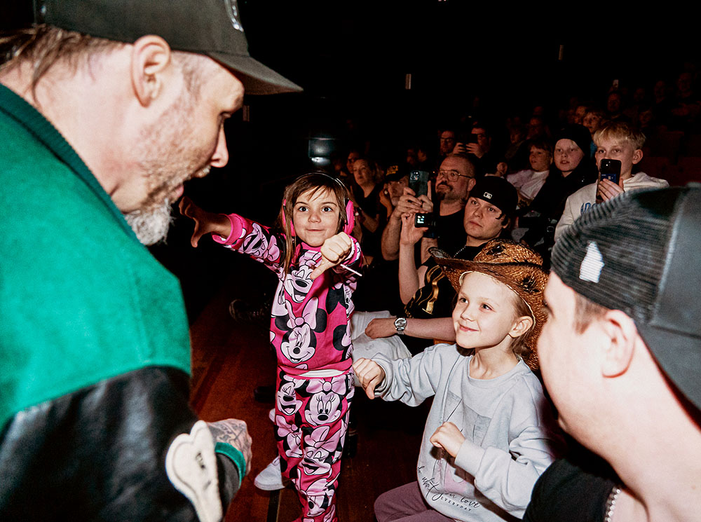 Canadian pro wrestler, The Back Breaker Dylan Broda from Ontario, heckling wrestling fans in the audience, 2025.